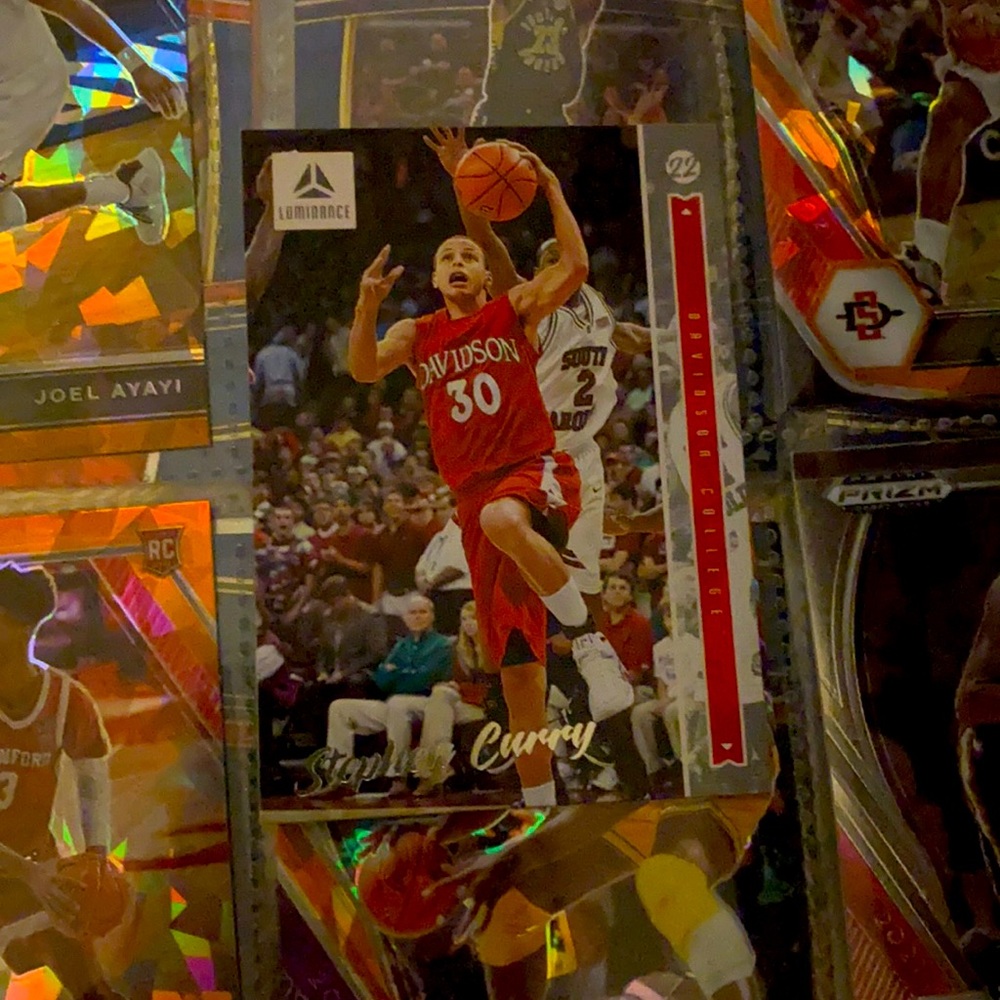 Stephan curry card.Buy 1 sports card listing get one random card free